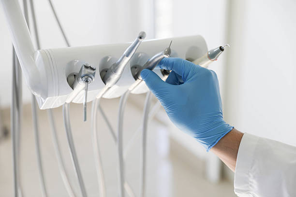Professional Tooth Extraction technician working in Connersville, IN